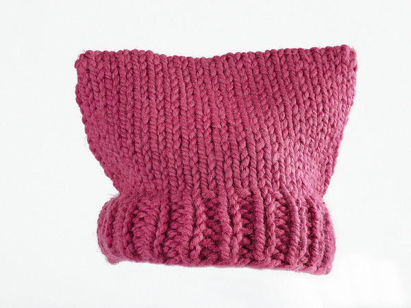 Pink knitted hat with abstract cat ears